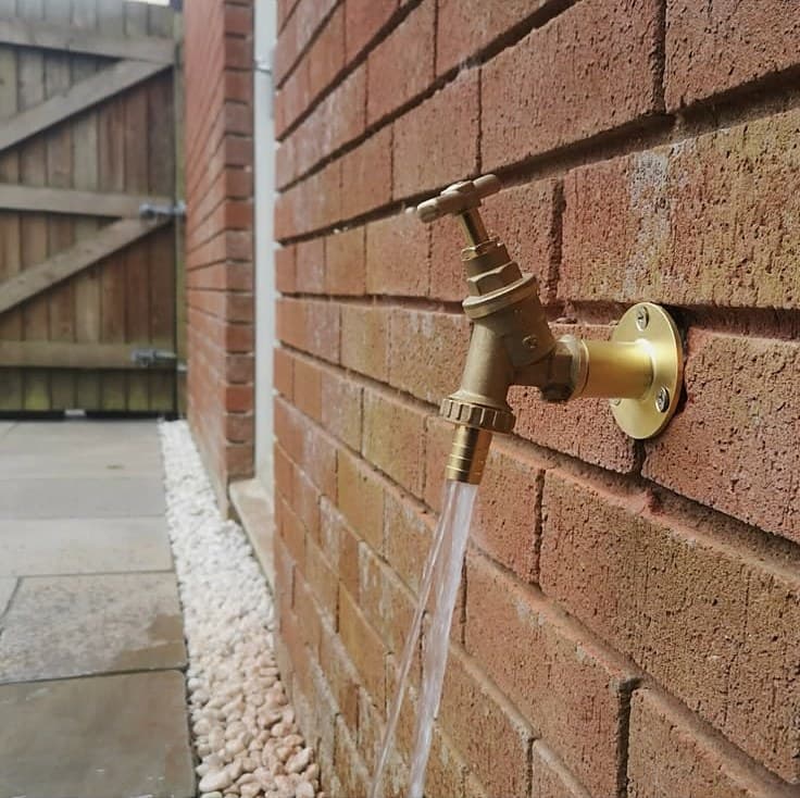 Brass outside tap fitted to a brick wall by TSPD Plumbing