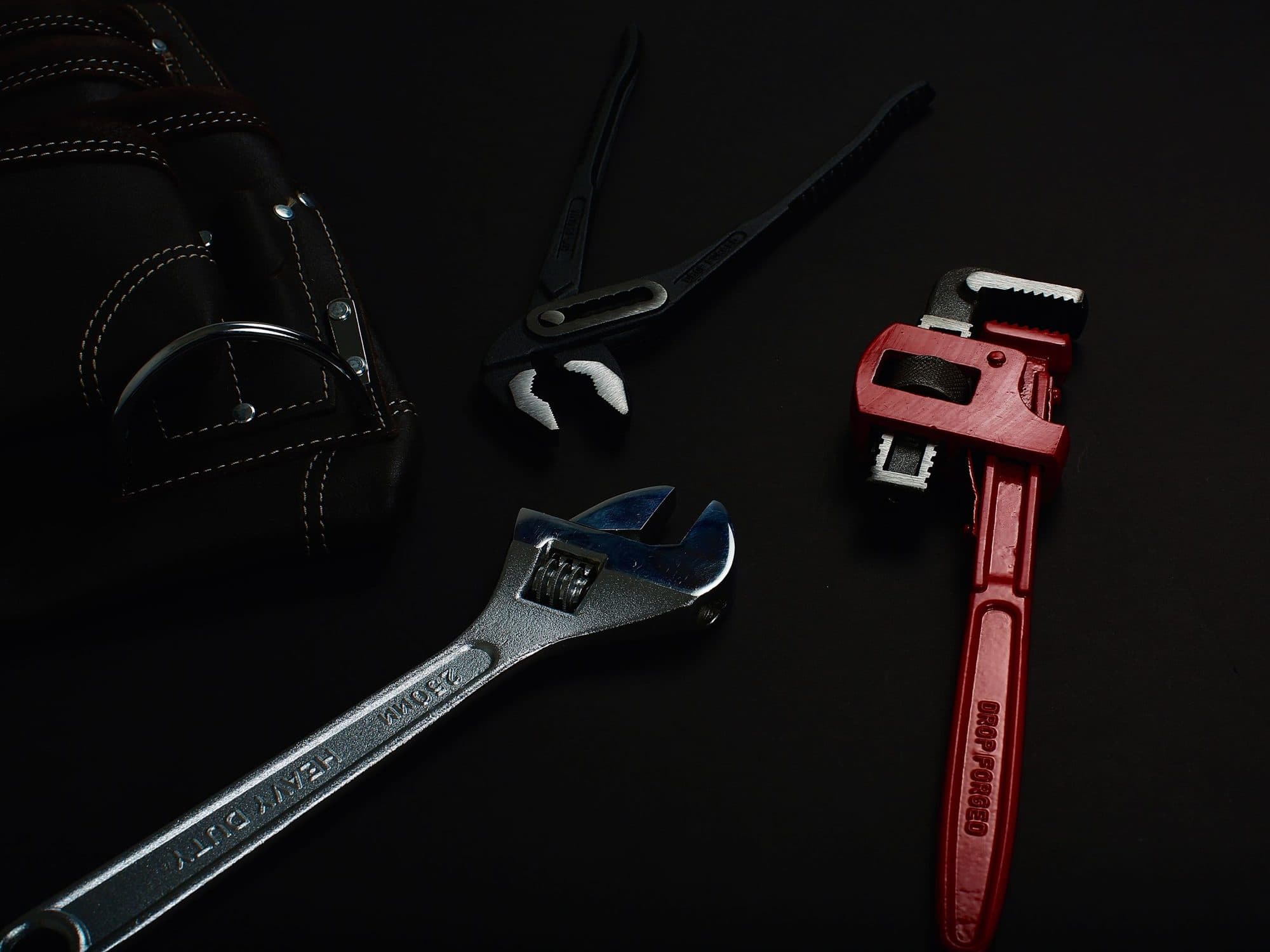 Pipe wrench, spanner and pliers